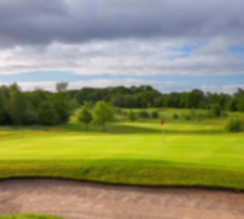 Superb shot of the undulating greens littered with bunkers at Worsley Park golf course