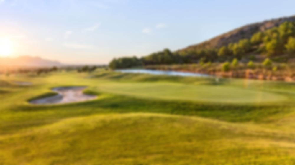 Sunrise in beautiful Benidorm with wide greens and mountainous surroundings