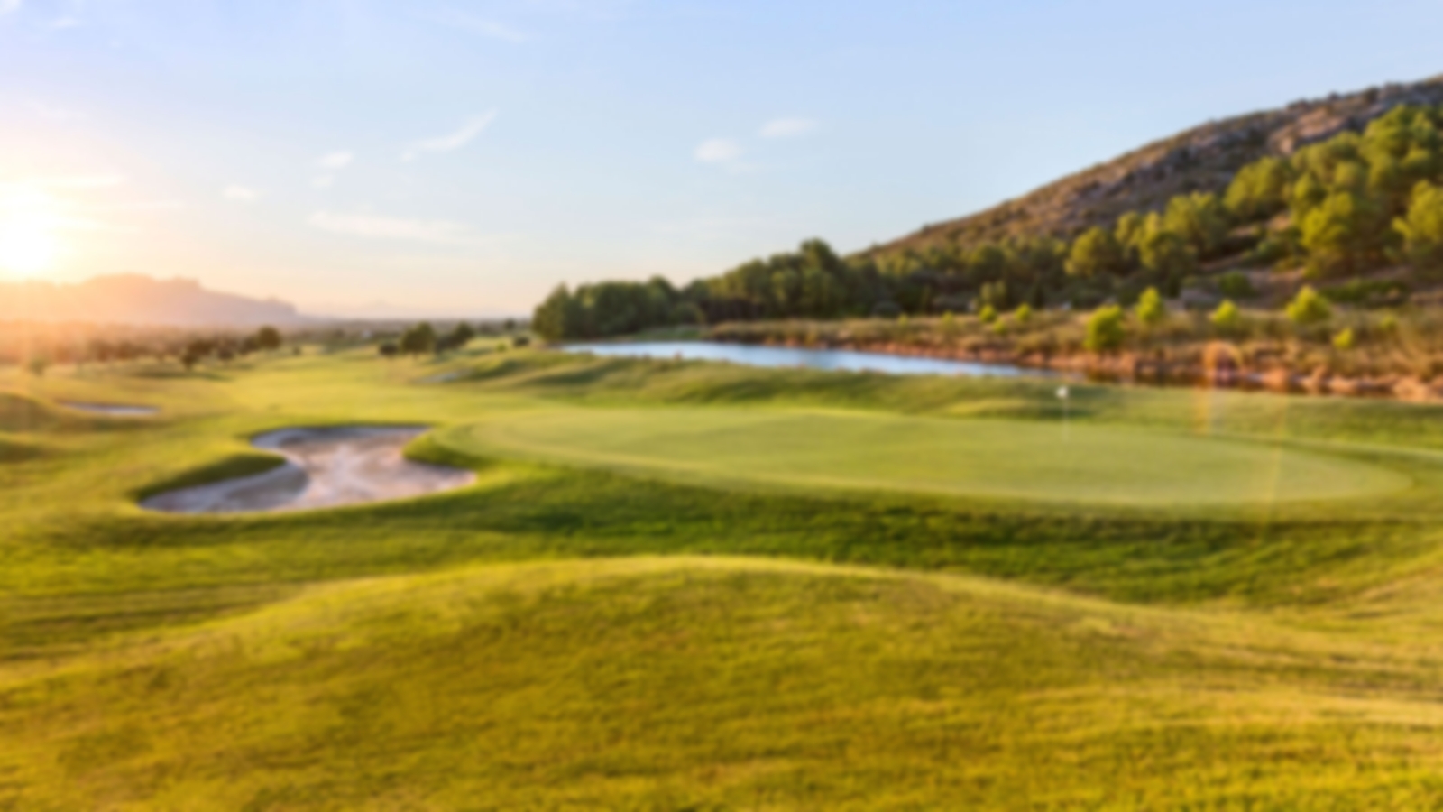 Sunrise in beautiful Benidorm with wide greens and mountainous surroundings