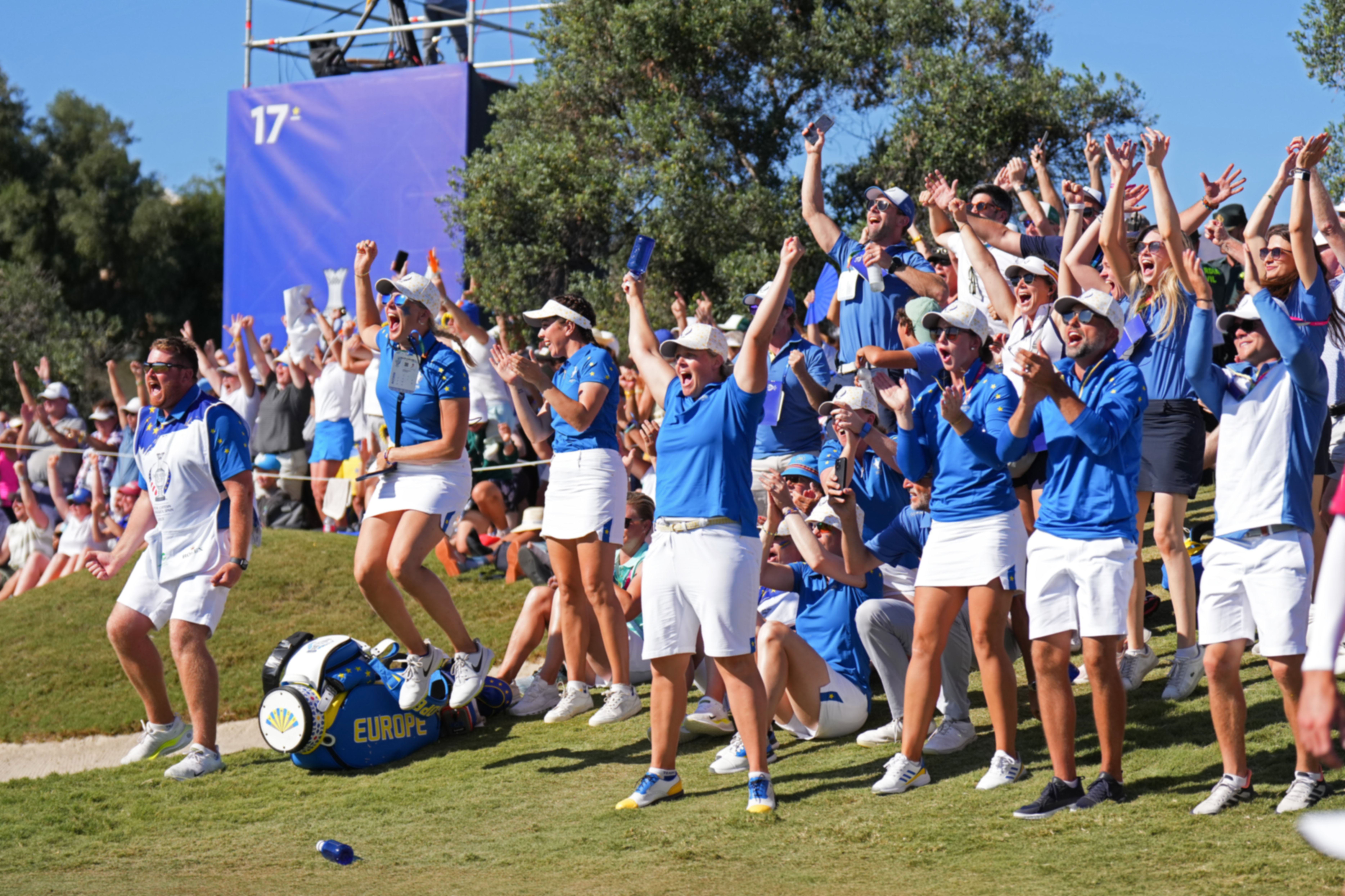 European players and fans cheering at the Solheim Cup
