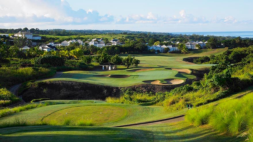 Upward view of a par 3 at Westmoreland, overlooking the distant houses and horizon.