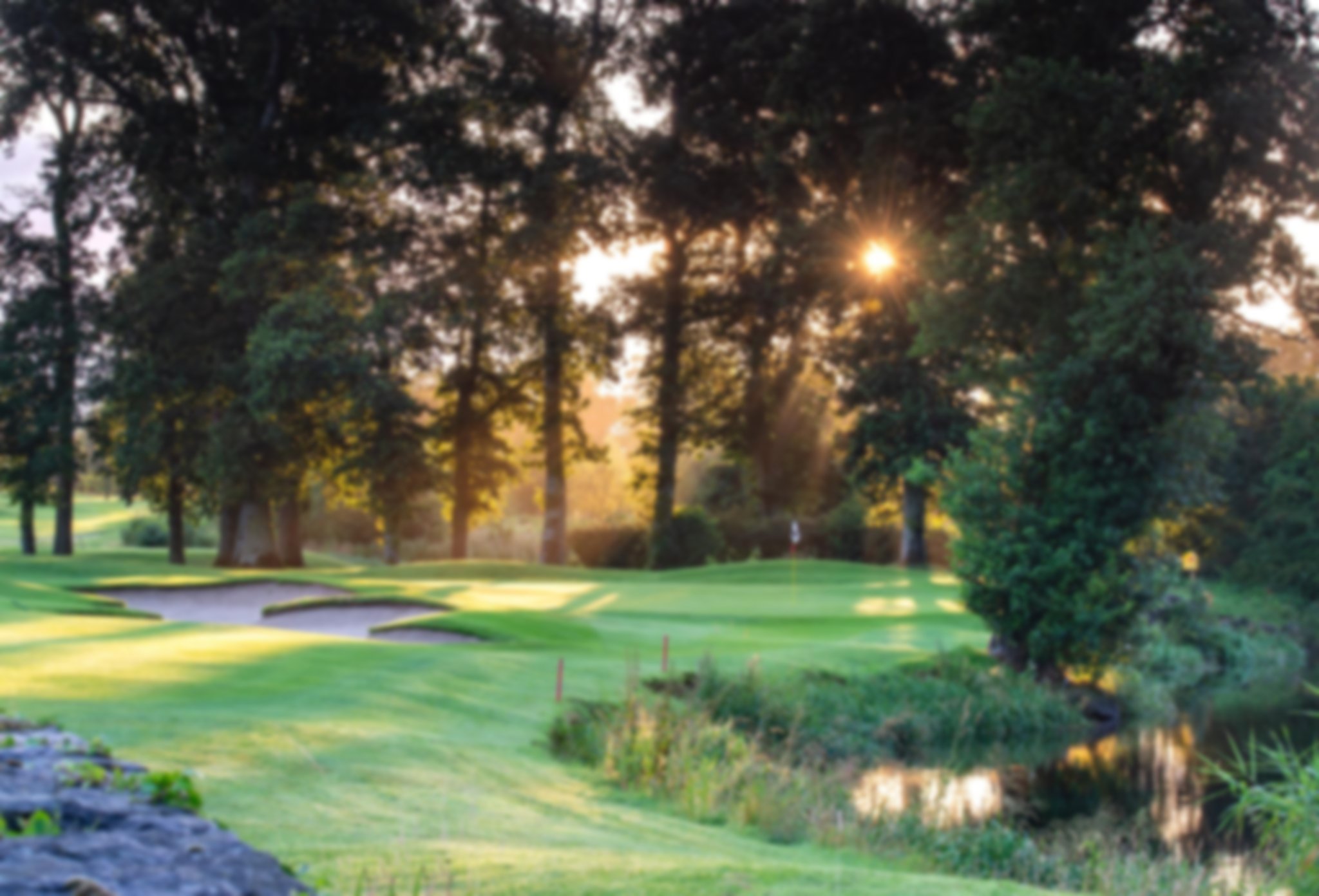 A view of a hole on the North Course as the sun is rising at The K Club