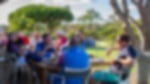 Clients seated at a bar at the Golfbreaks Pairs Event