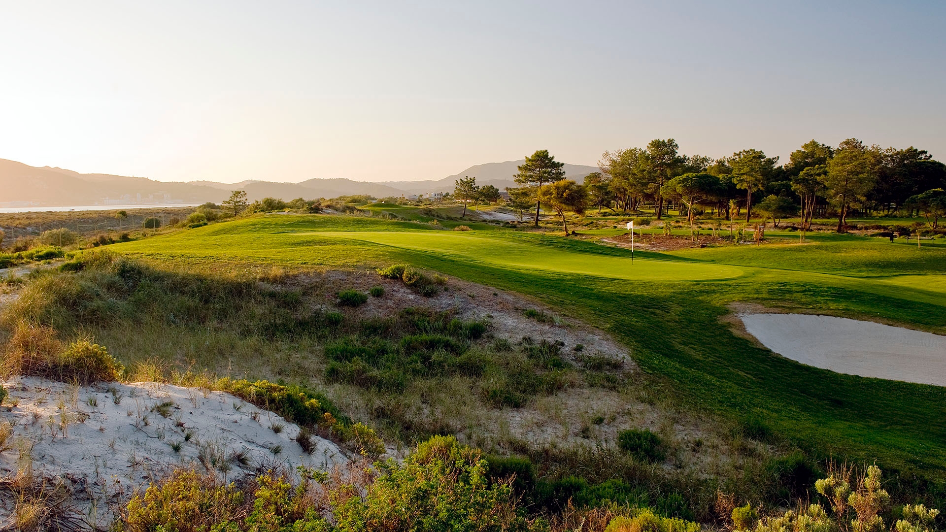 Sunrise over the stunning Troia raised green