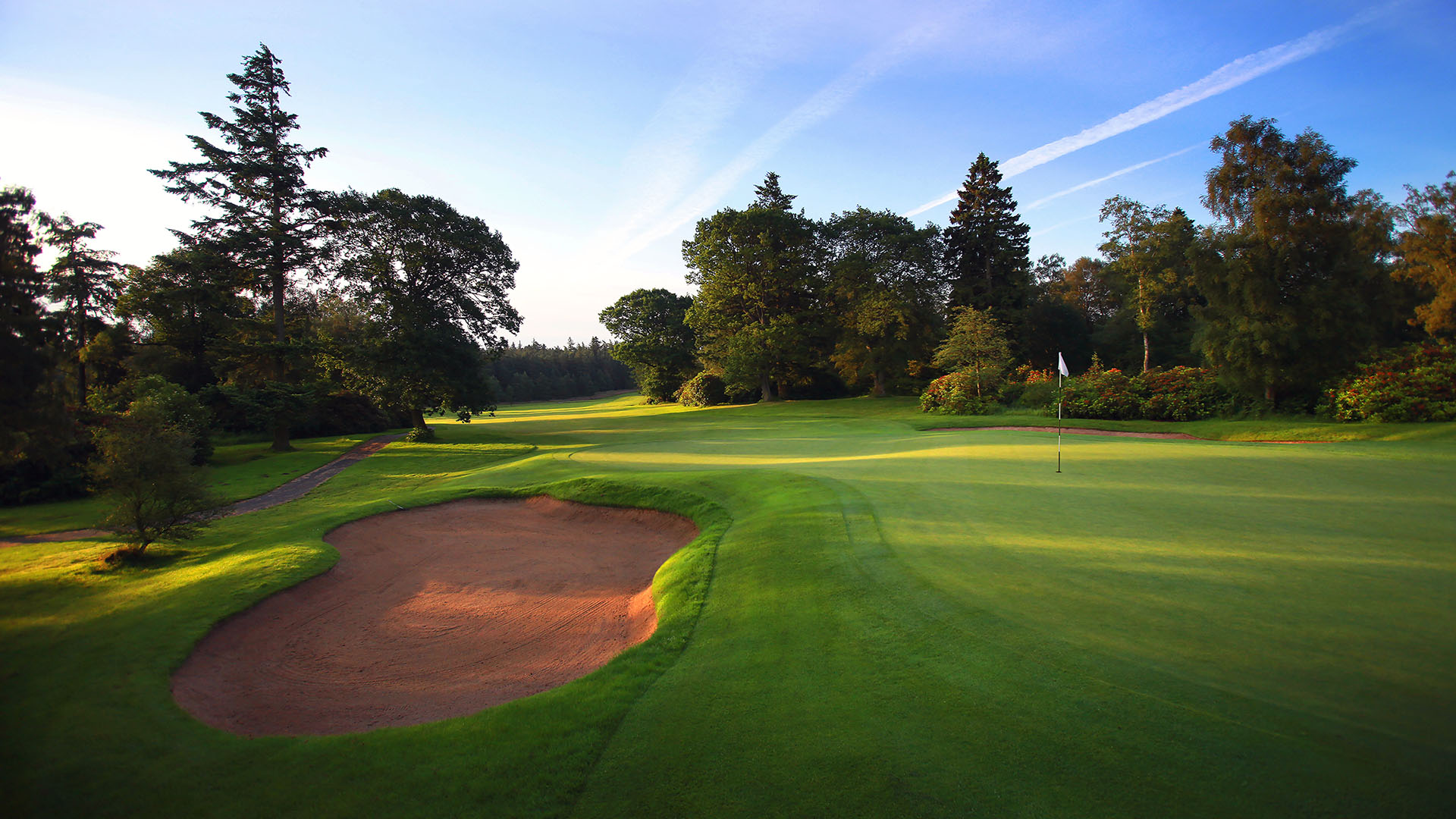 Tree-lined fairways to a large green