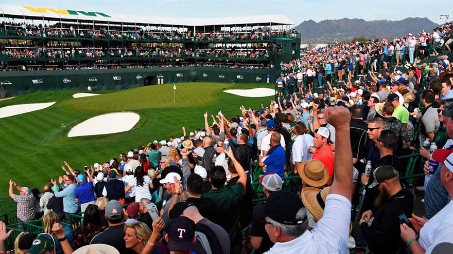 Packed grandstand of cheering spectators at Waste Management Phoenix Open