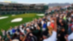 Packed grandstand of cheering spectators at Waste Management Phoenix Open