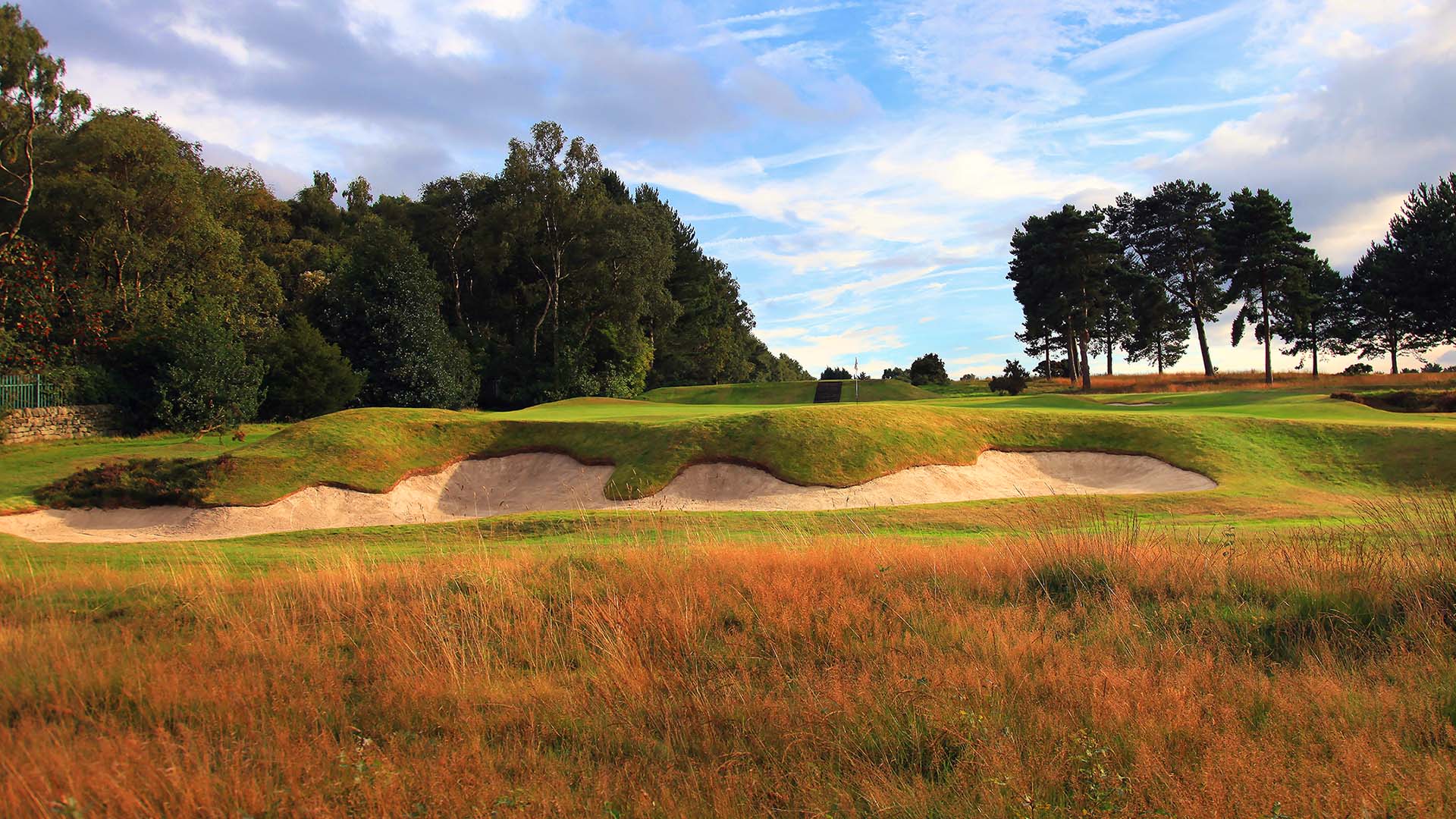 Large bunker on the approach to the green