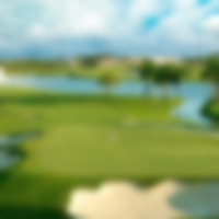 The green at Doral guarded by bunkers at the back and side. Water is to the left of your approach shots, adding to the challenge.