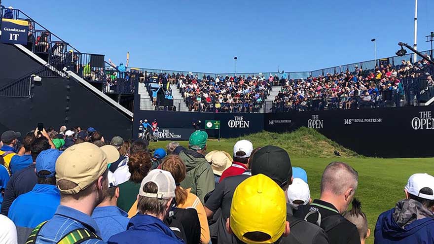 Spectators watching the players tee off at the The Open, Royal Portrush 2019