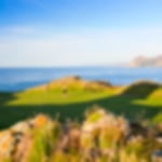 Spectacular green overlooking the sea at Nefyn & District Golf Club.