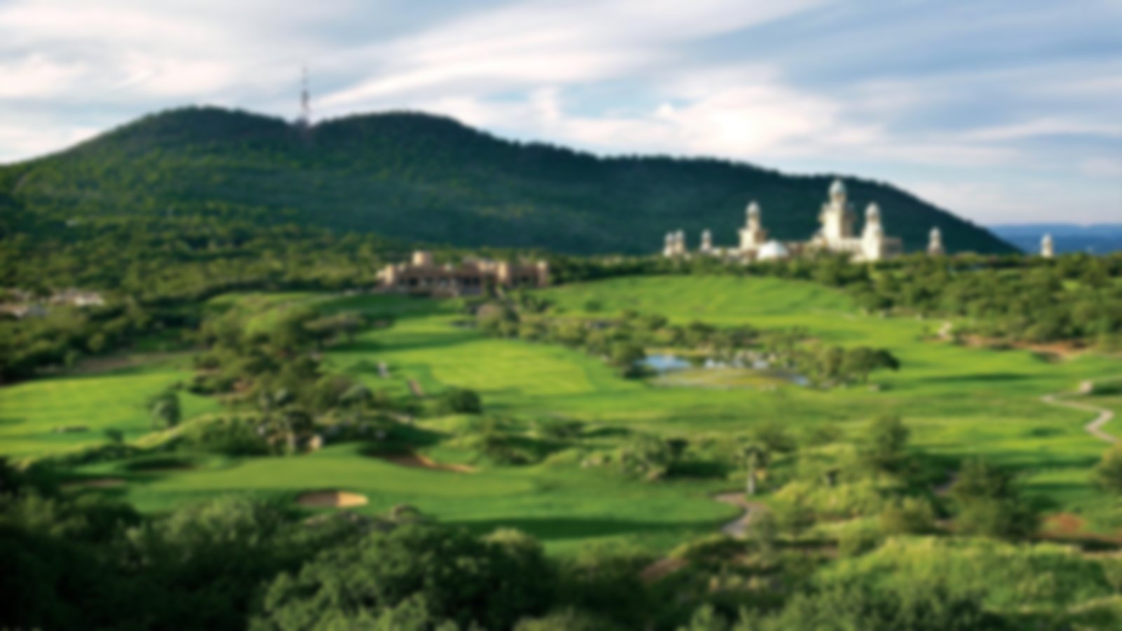 Aerial view of Sun City Golf with the mountains in the background.