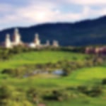 Aerial view of Sun City Golf with the mountains in the background.