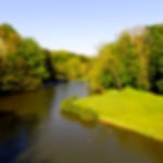 River around the back of the 12th hole