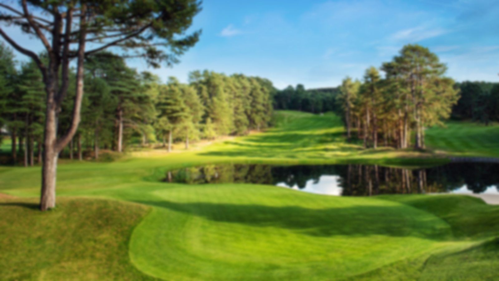 Lake fronted green at the beautiful Hardelot Golf Club.