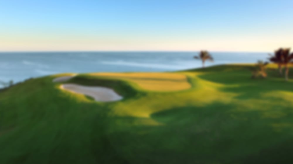 Coastal view of Melonares with beautiful weather and luxurious green fairways.