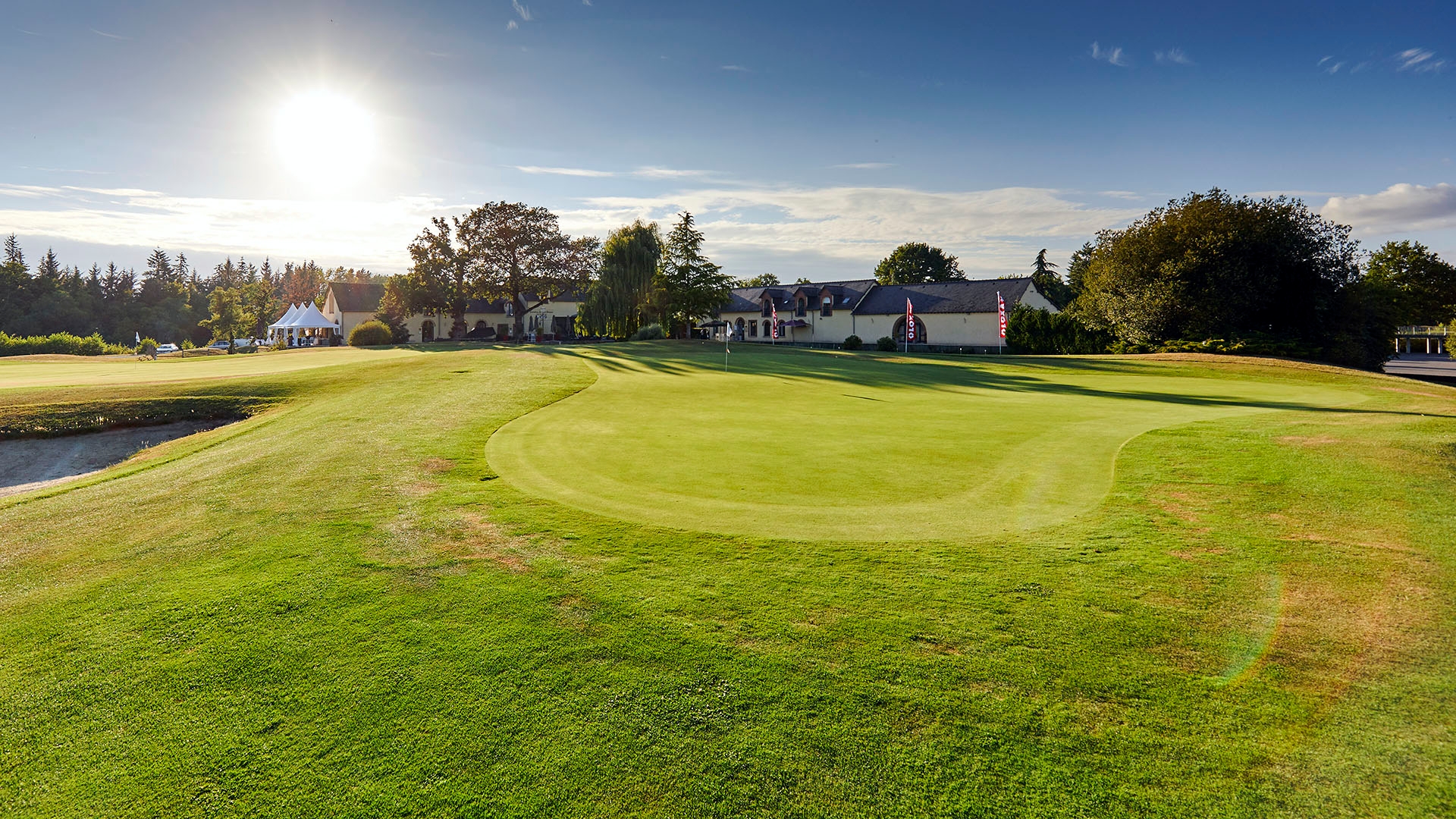 The manicured greens at