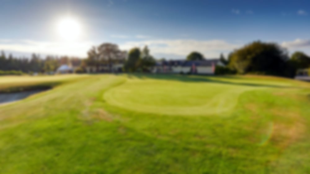 The manicured greens at