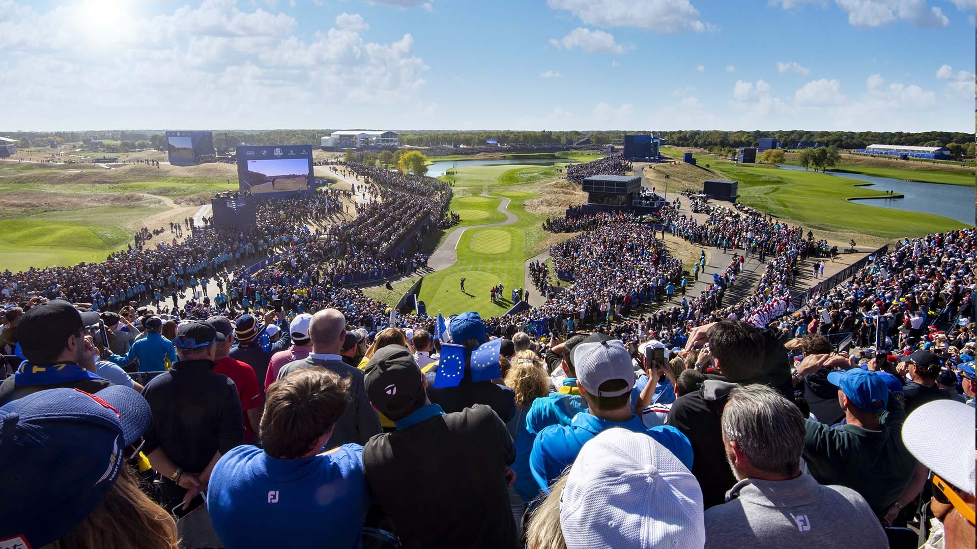 Packed crowds watch players tee off at the 2018 Ryder Cup, Paris, France.