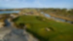 Aerial view of the fairway and green at Kiawah Island. Water hazards are guarding both sides of the green.