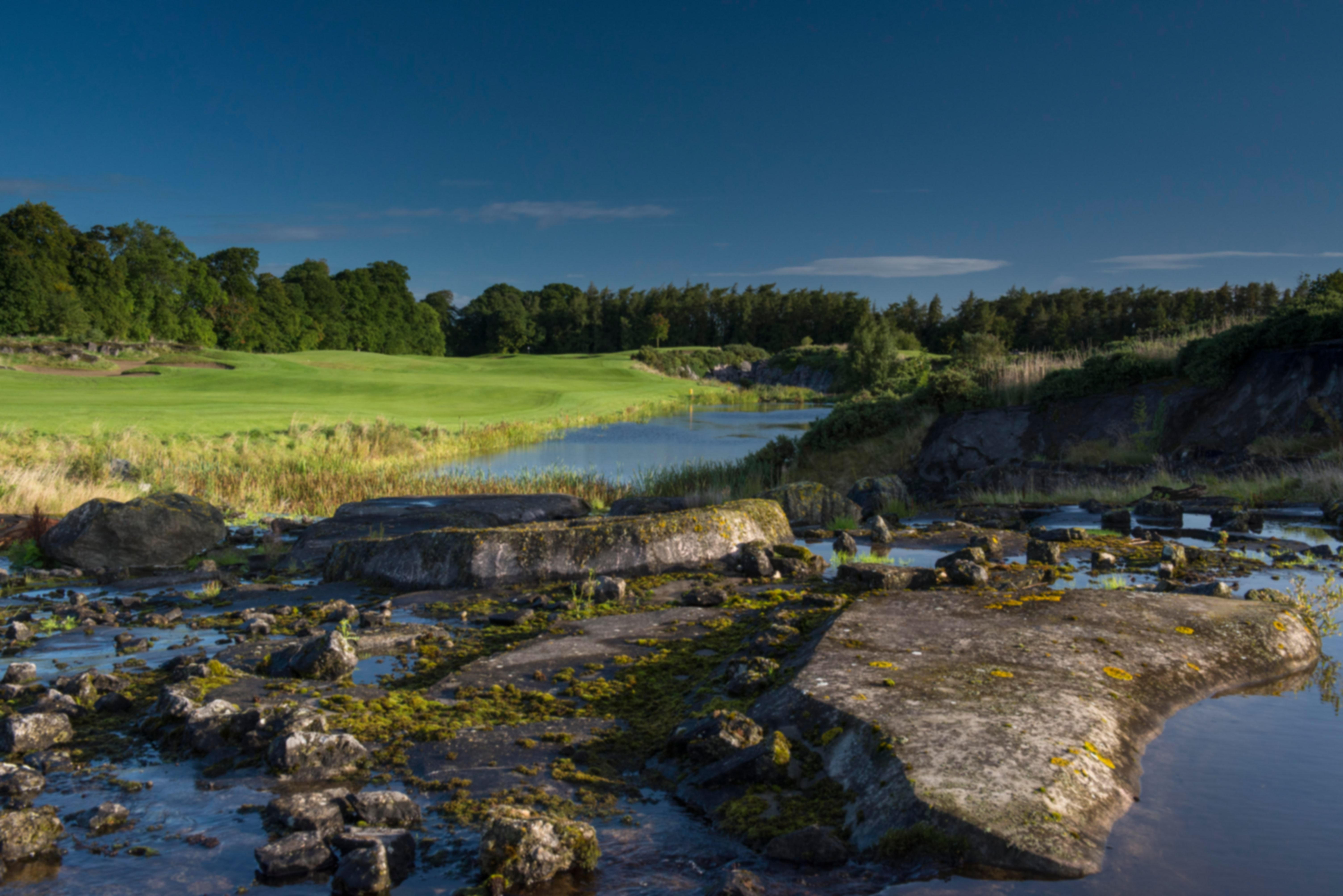 A view of the 7th hole on the South course with water running along the hole at The K Club