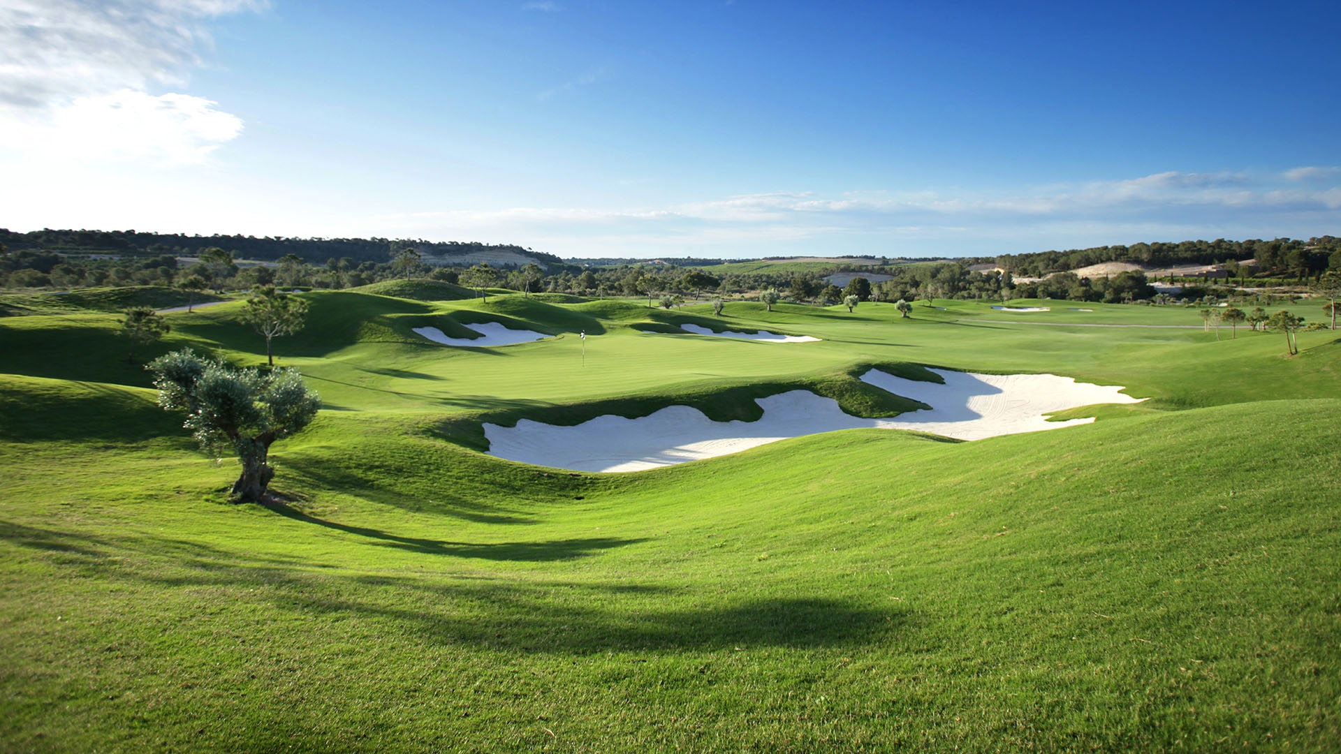 Piercing blue skies over the large bunkers of Las Colinas