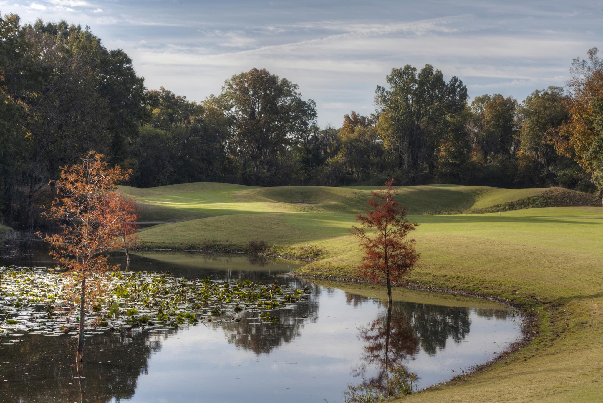 15th hole of the Judge Course at Capitol Hill with lake and trees