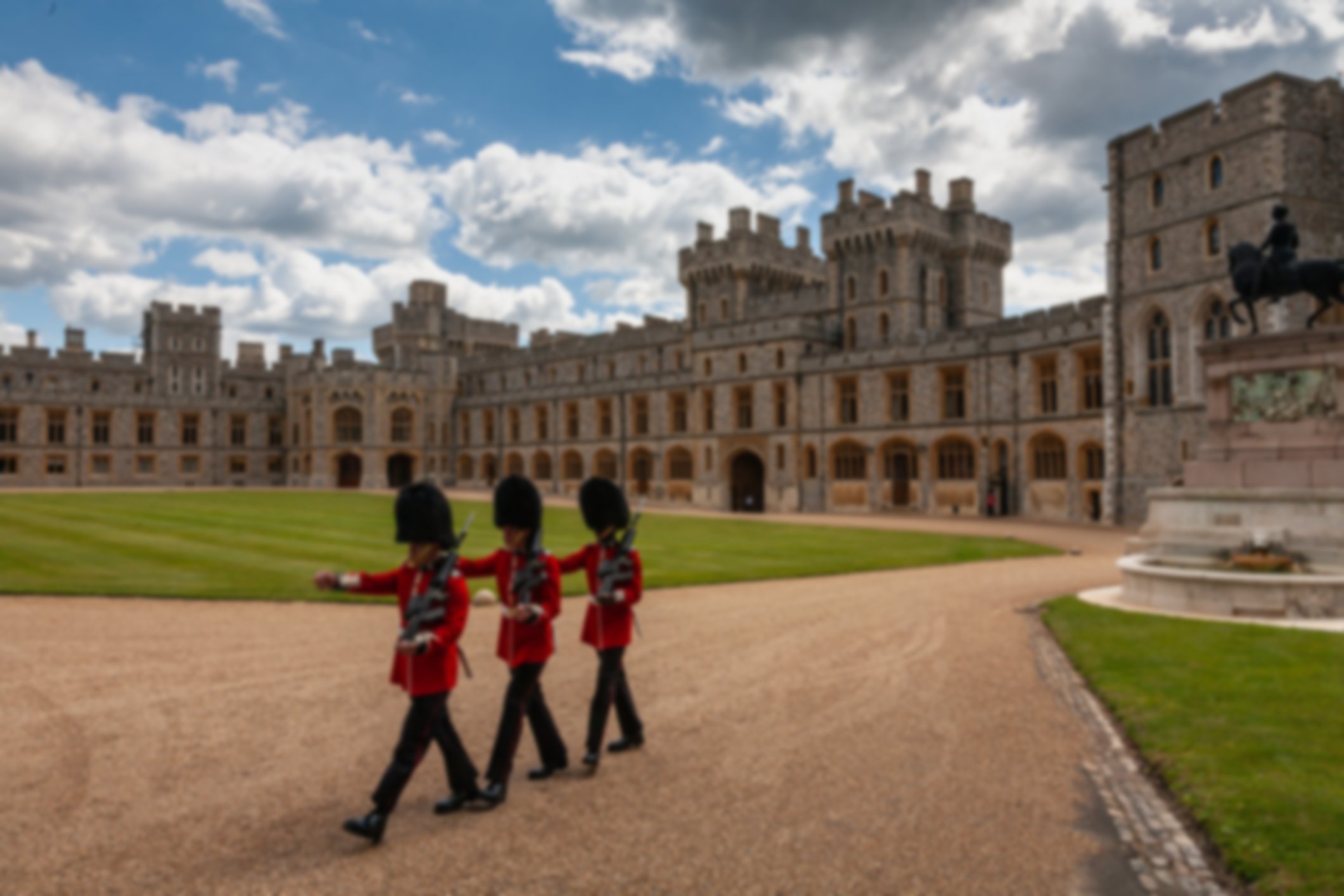 Windsor Castle on a sunny day with guards in the foreground