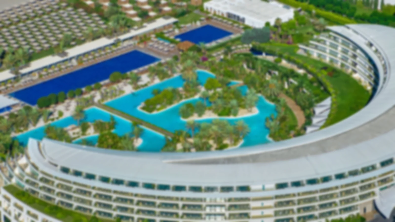 Bird's-eye view of the rear of Maxx Royal Hotel, featuring the resort grounds and landscaped areas.