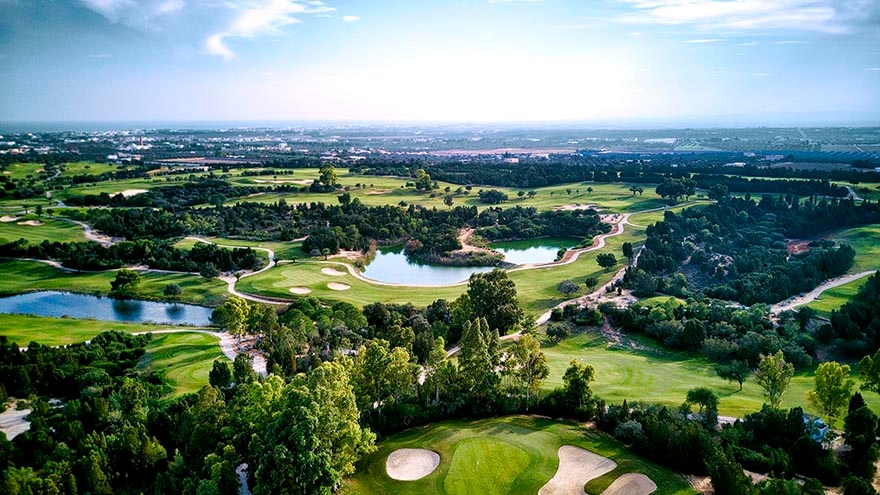 Aerial view of Golf Citrus with a lot of water hazards and trees.