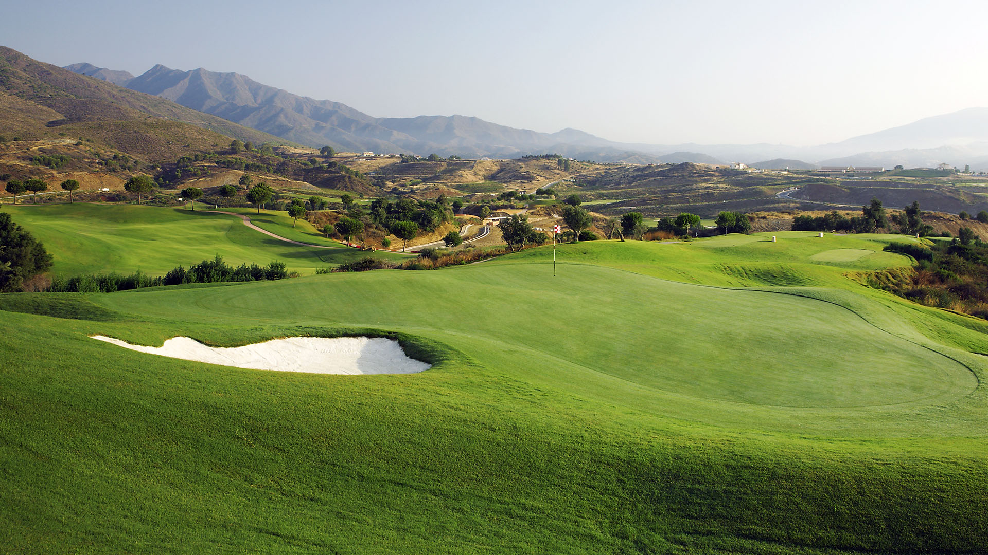 Mountain views of La Cala with the green and bunker.