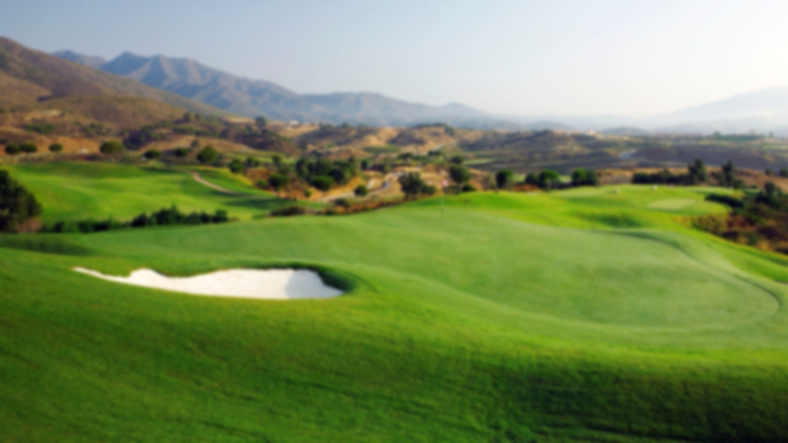 Mountain views of La Cala with the green and bunker.