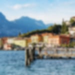 Lakeside houses and with mountainous surroundings