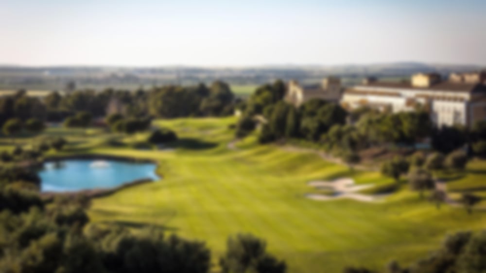 The wide fairways of Barcello Montecastillo with blue skies above