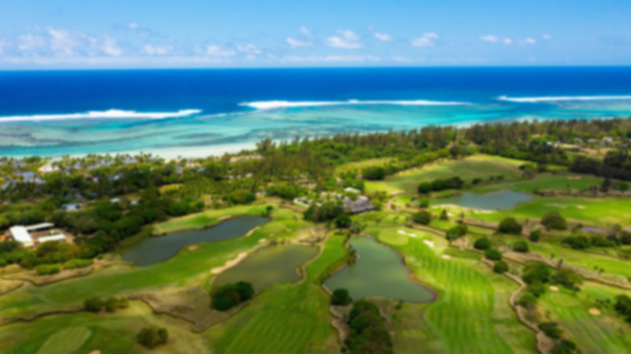 Stunning blue sea view aerial of La Chateau Golf Course