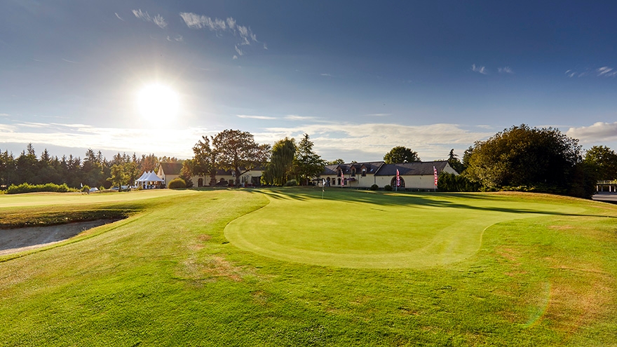 The manicured greens at