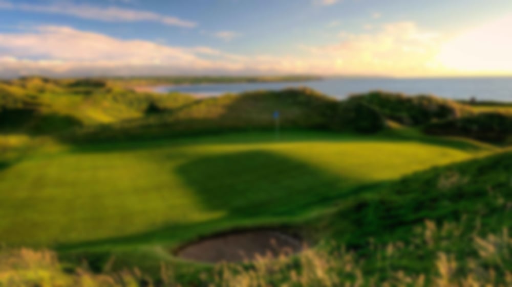 Green at Ballybunion surrounded by spectacular sand dunes.