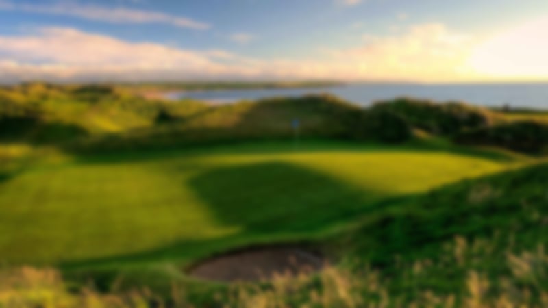Green at Ballybunion surrounded by spectacular sand dunes.