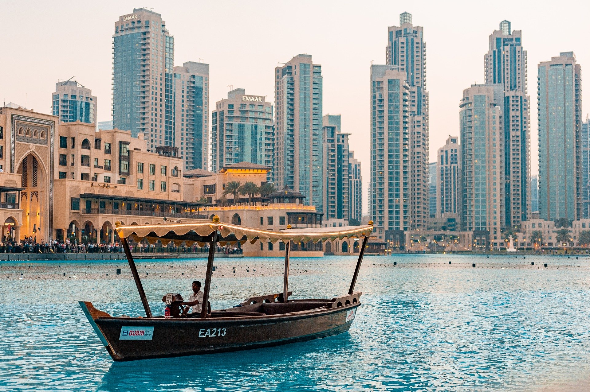 Downtown Dubai, local taking a boat ride on the water
