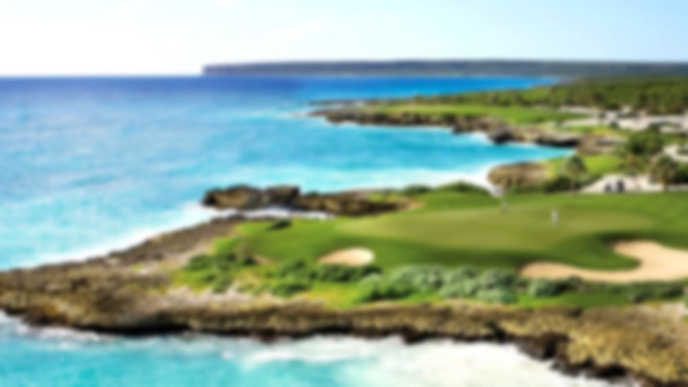 Fairway and hole that run next to the stunning clear blue sea at Punta Espada.