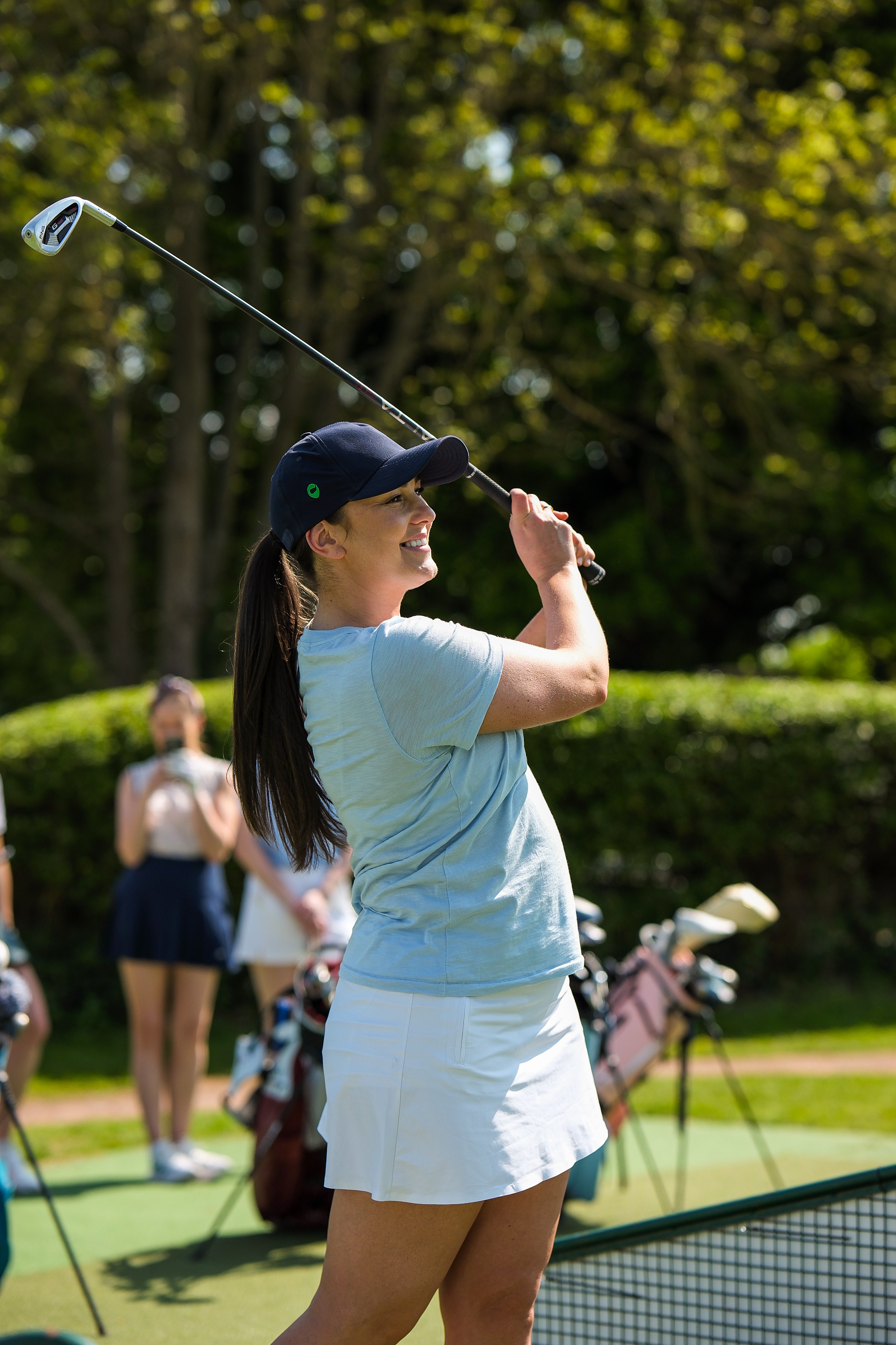 Women-golf-swing-range-kelly-tidy
