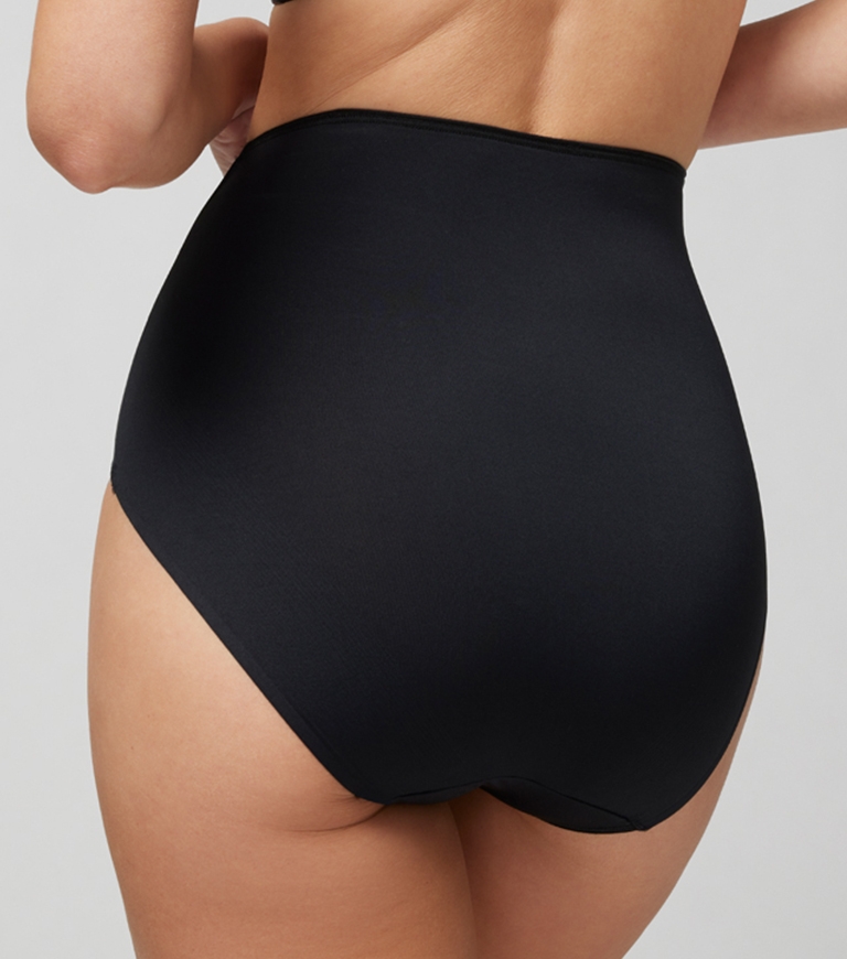 oma<sup class=st-superscript>®</sup> women’s model wearing a black high-rise brief panty.