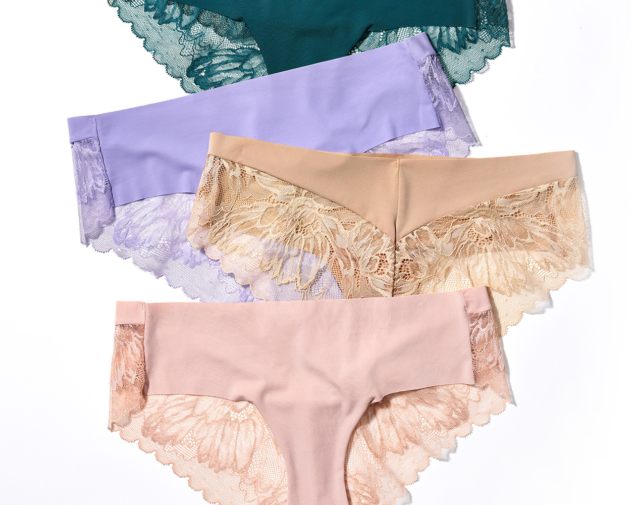 Soma<sup class=st-superscript>®</sup> laydown of lace-back hipster panties in dark blue, purple, nude, and light pink.