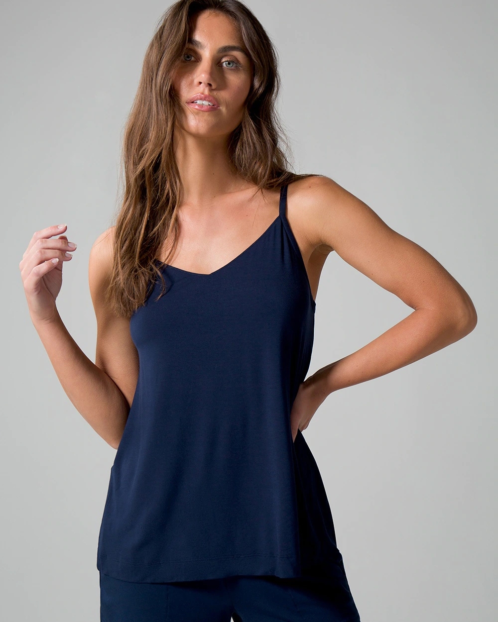 Soma<sup class=st-superscript>®</sup> women’s model wearing navy shorts and a navy tank top.