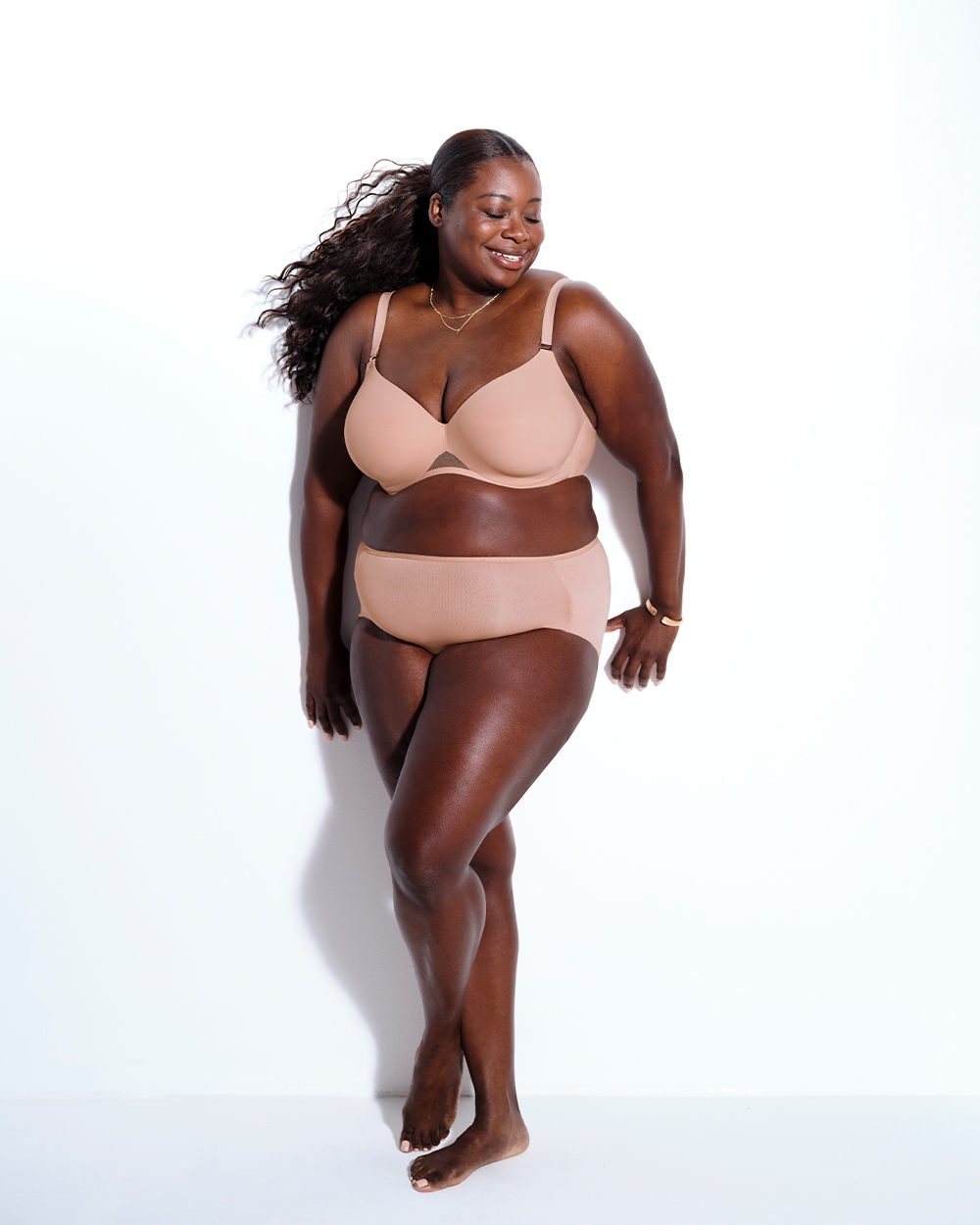 Soma Women’s model wearing a nude Bodify<sup class=st-superscript>™</sup>Perfect Coverage Bra and nude panties.