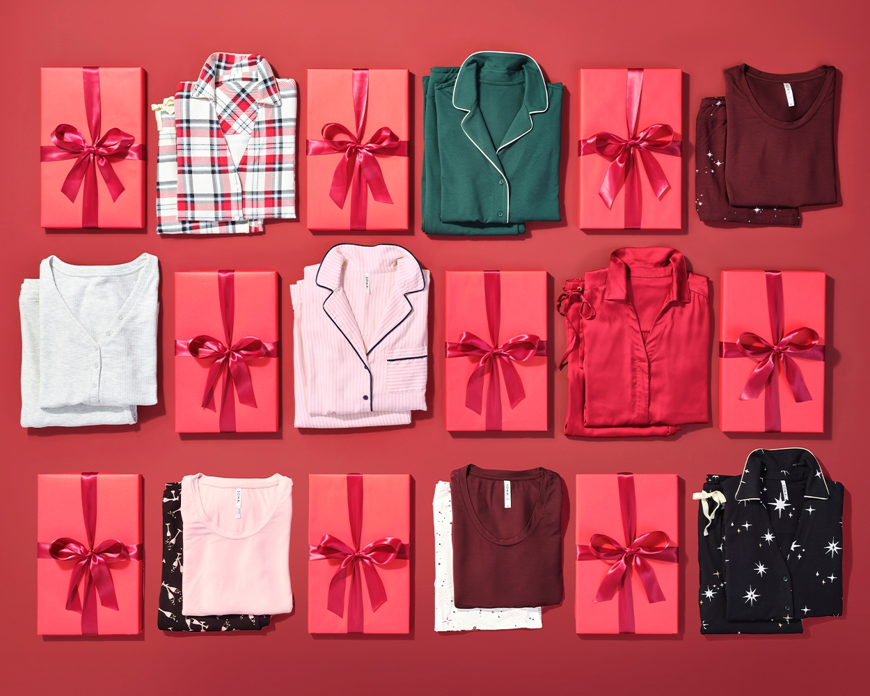 Soma<sup class=st-superscript>®</sup> laydown of red gift boxes and a variety of pajama sets in different styles, colors and prints.-Care-Tips-for-the-Holidays_Single_1250x1000.jpg
