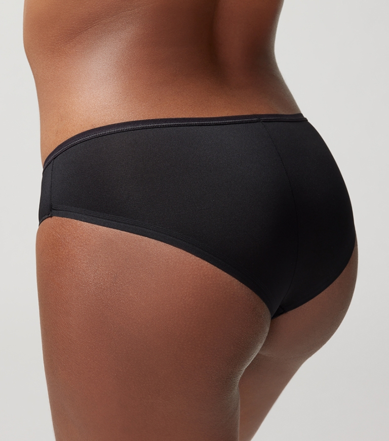 Soma<sup class=st-superscript>®</sup> women’s model wearing black cheeky panties.