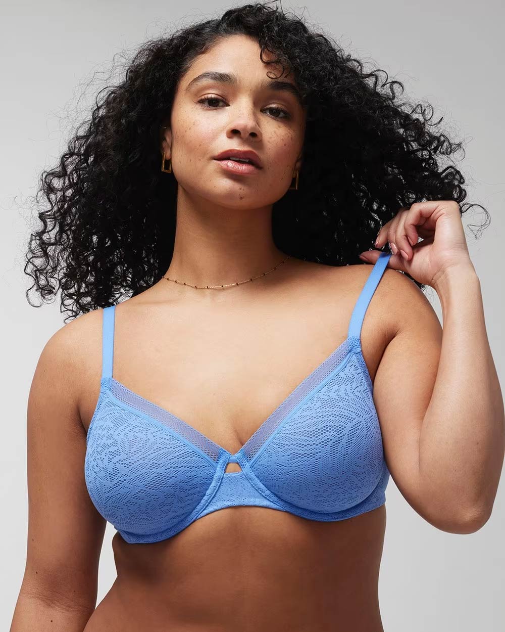 Soma<sup class=st-superscript>®</sup> women’s model wearing a blue unlined lace bra.