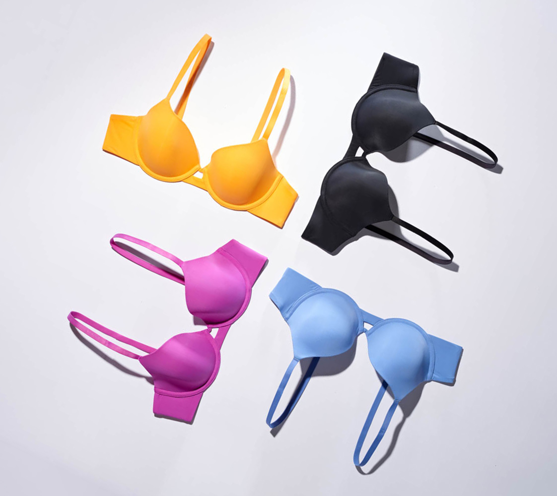 Soma<sup class=st-superscript>®</sup> laydown of sweetheart neckline bras in orange, purple, black, and blue.