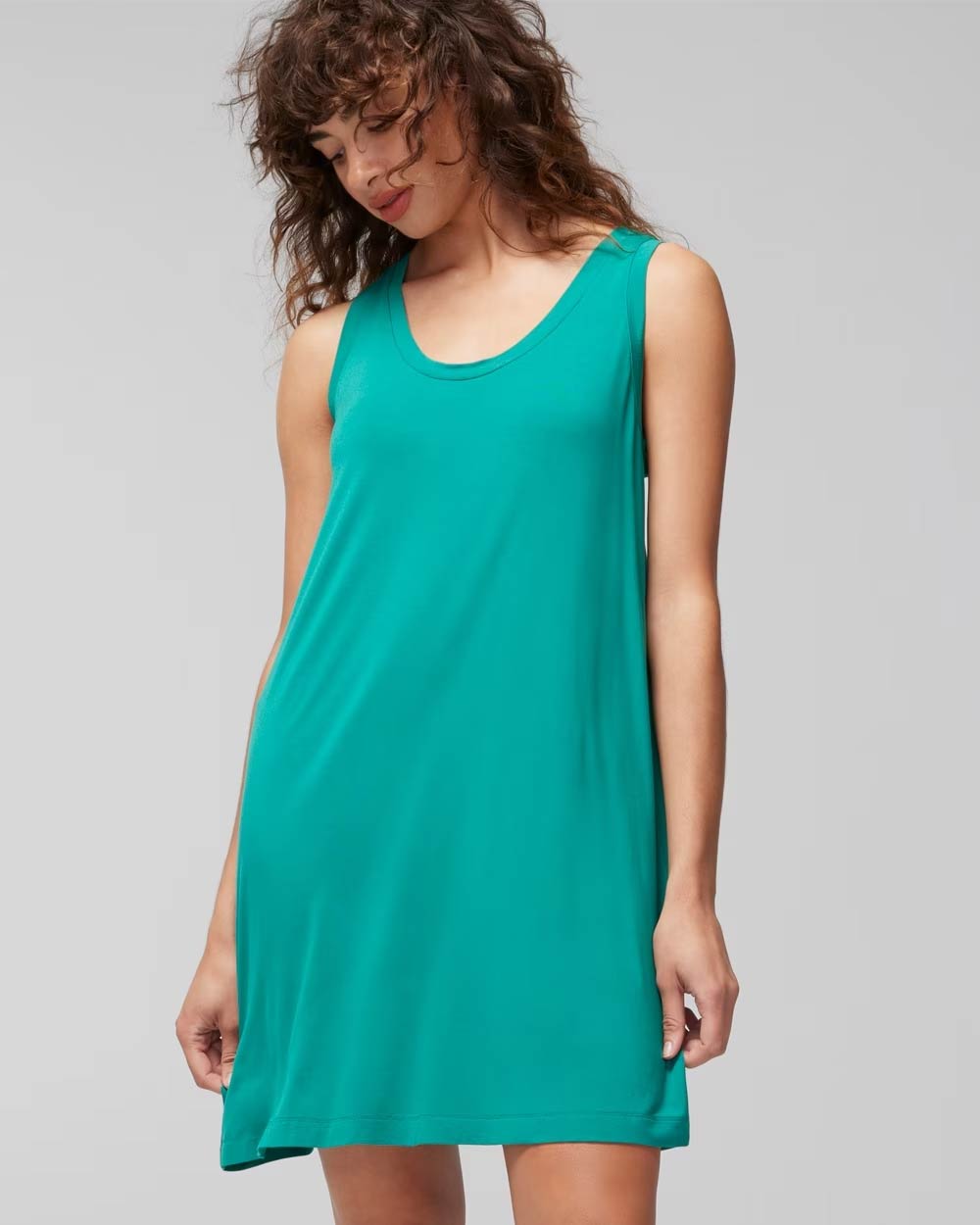 Soma<sup class=st-superscript>®</sup> women’s model wearing a teal green tank sleepshirt. 